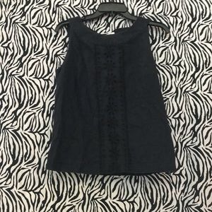 Navy top with floral details